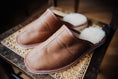 Load image into Gallery viewer, Close-up of sustainable leather men's slippers, showcasing their soft texture and intricate details.