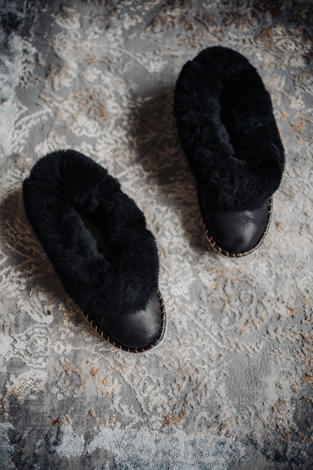 Black leather and fur sheepskin moccasins, handmade in Poland