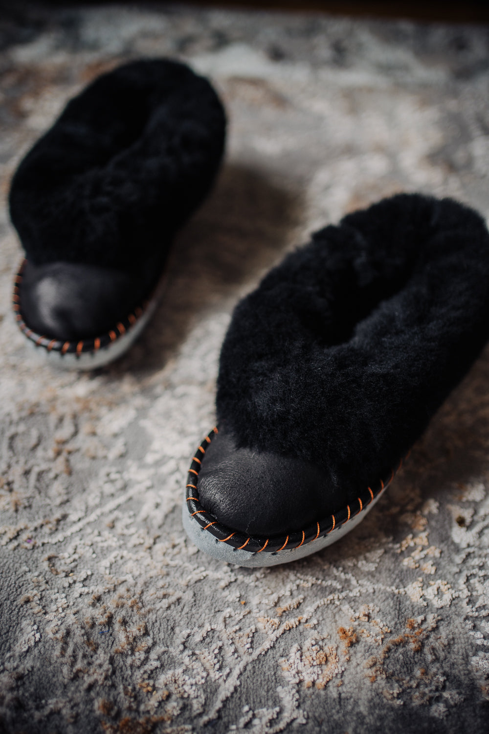 Black leather and fur sheepskin moccasins, handmade in Poland