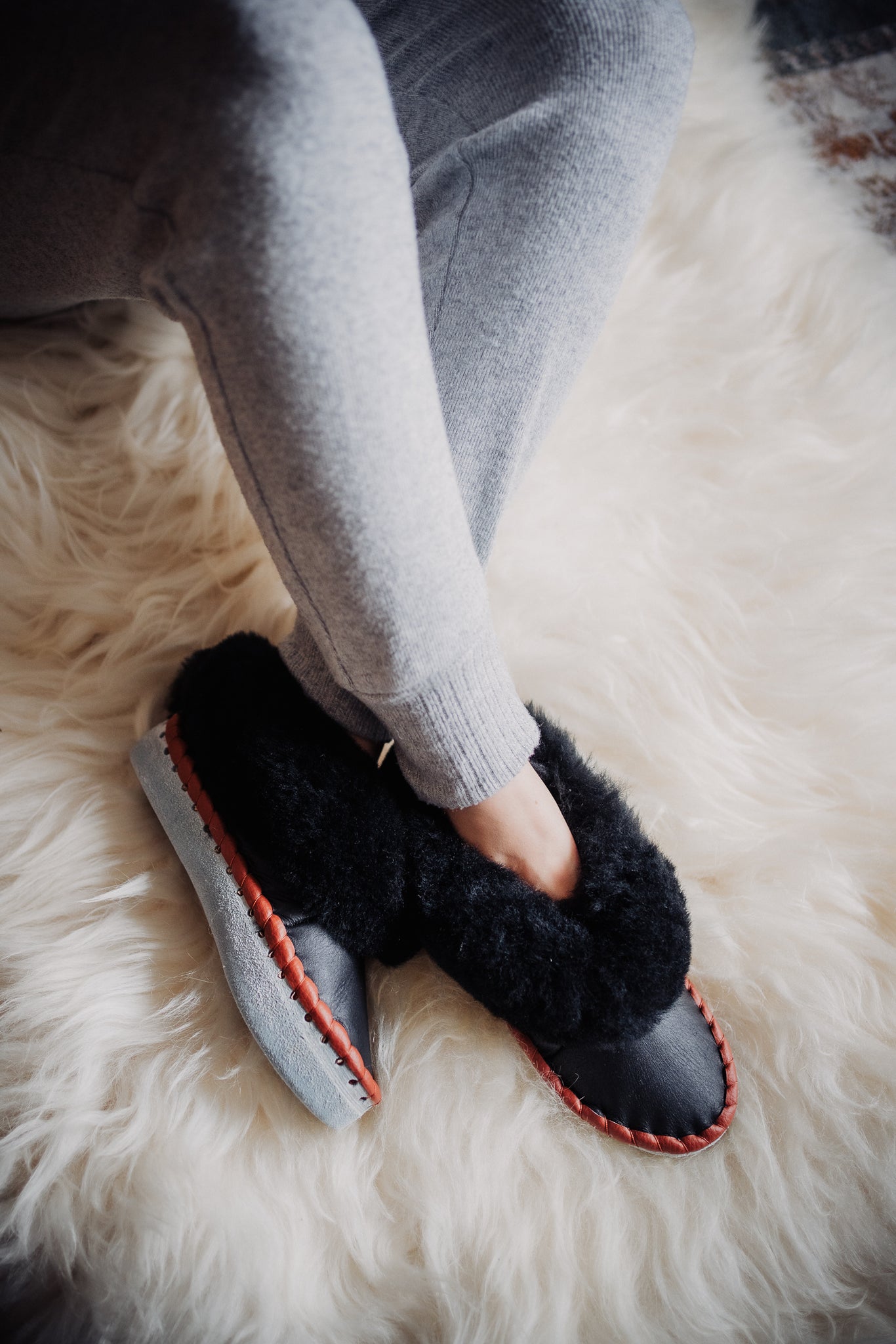 Ladies black sheepskin slippers, handmade in Poland by Bamboshe
