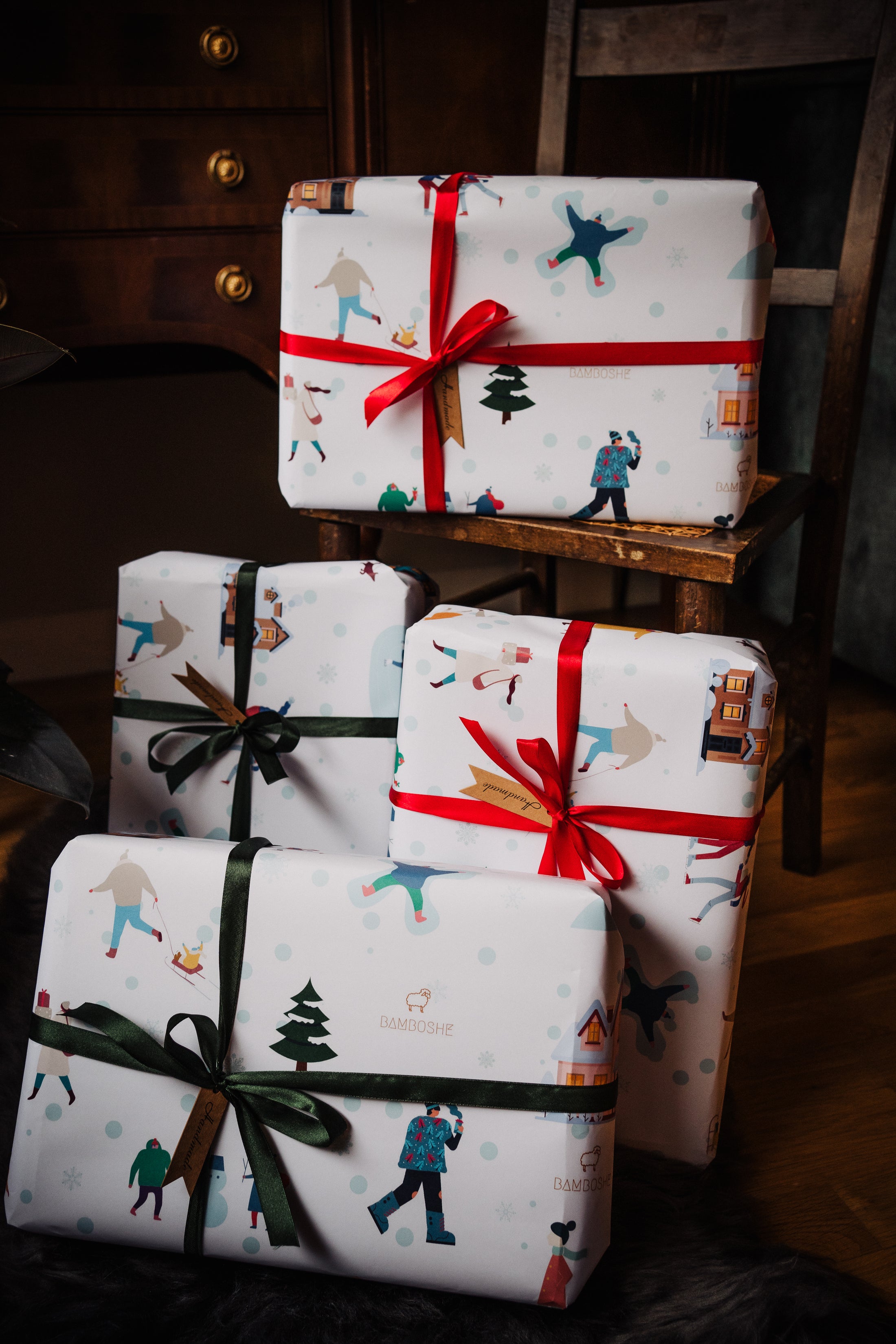 Beautifully packaged gifts with meticulous care, featuring Bamboshe gift wrapping adorned with green and red ribbons.