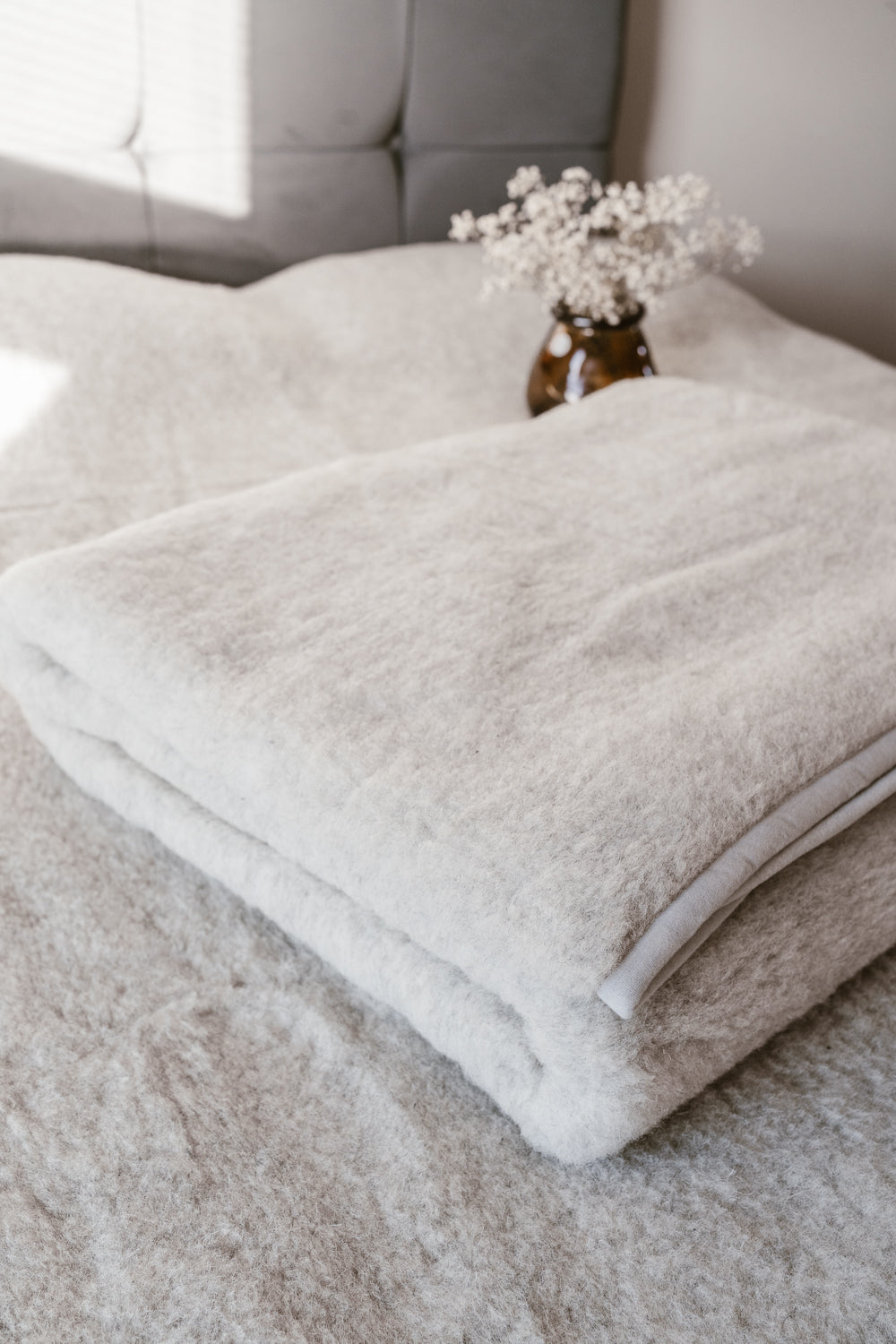 Woollen bed cover, duvet, merino wool blanket in grey colour