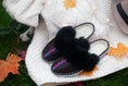 Load image into Gallery viewer, Hand made sheepskin slippers mules displayed on wool jumper with autumn leaves 
